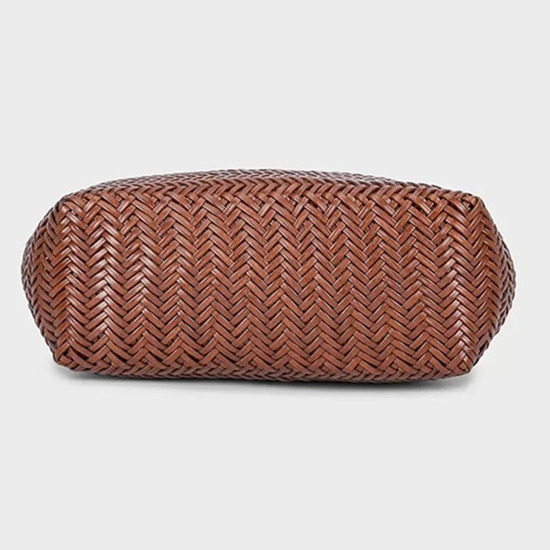 Brown woven ottoman on a light gray background