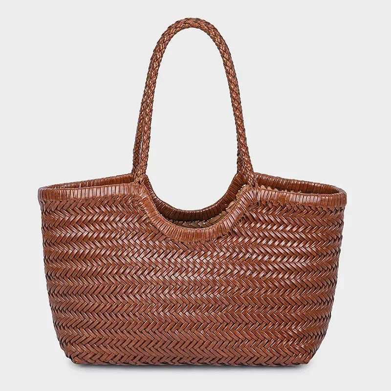Brown woven handbag on a light gray background