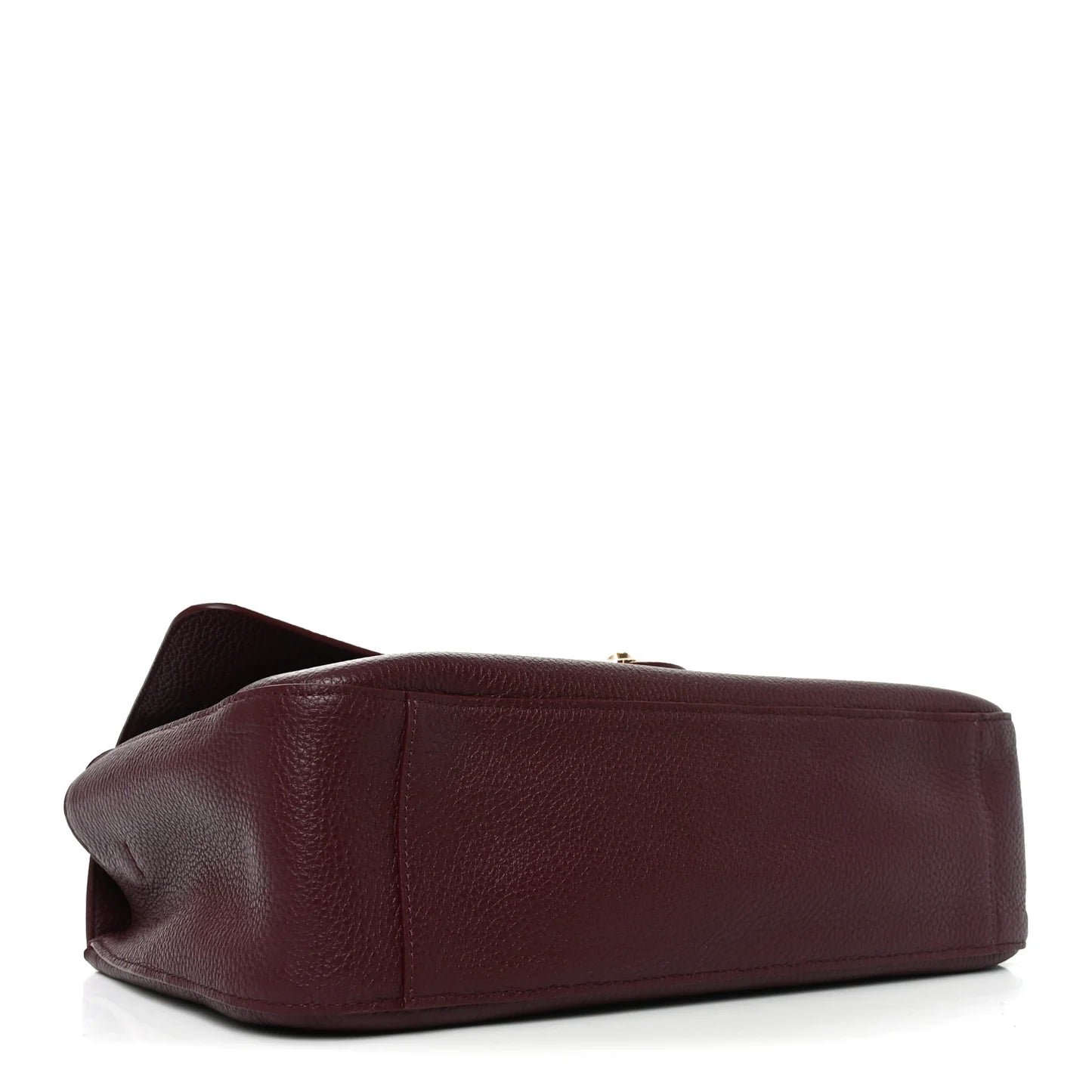 Burgundy leather handbag on a white background