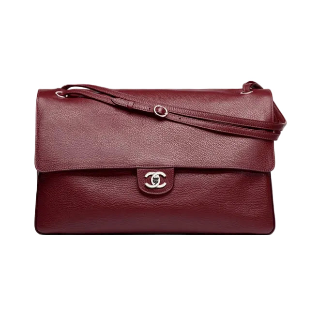 Burgundy handbag with a visible brand logo on a white background
