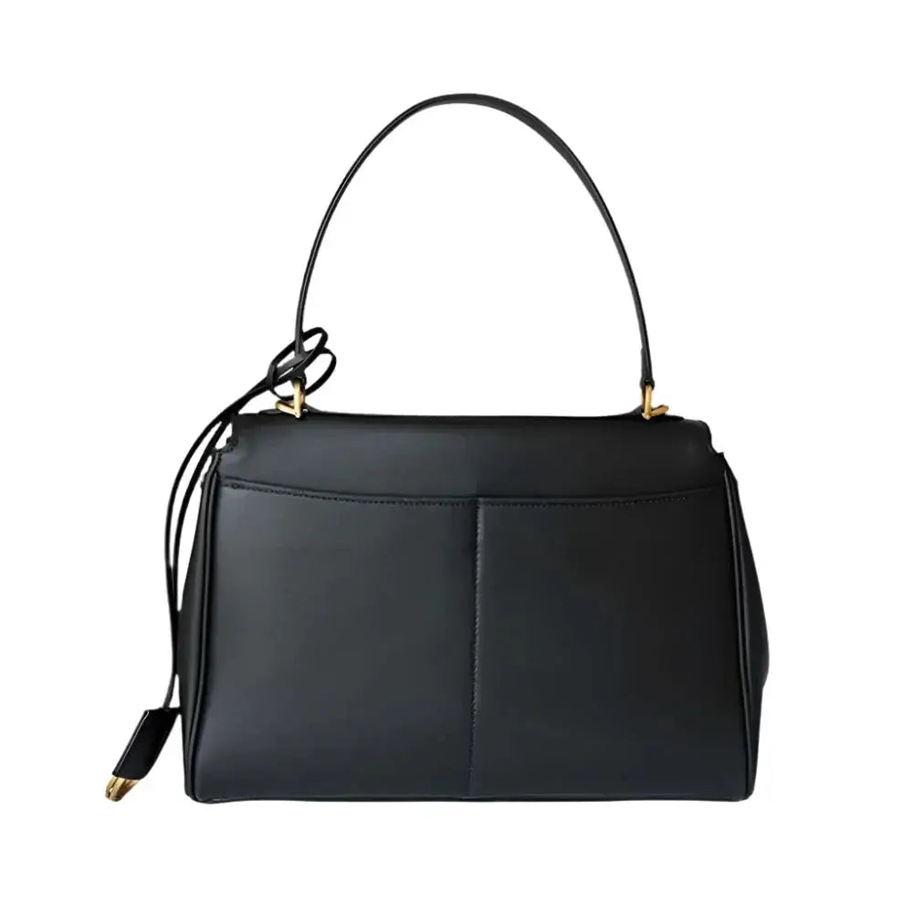 Black handbag with a strap on a white background