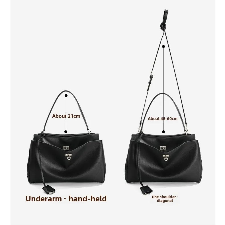 Black leather handbag shown in two views with measurement callouts: a smaller underarm/hand-held view about 21 cm wide, and a larger one-shoulder diagonal view about 48-60 cm wide. The image includes text labels and dimension guides on a light gray background.