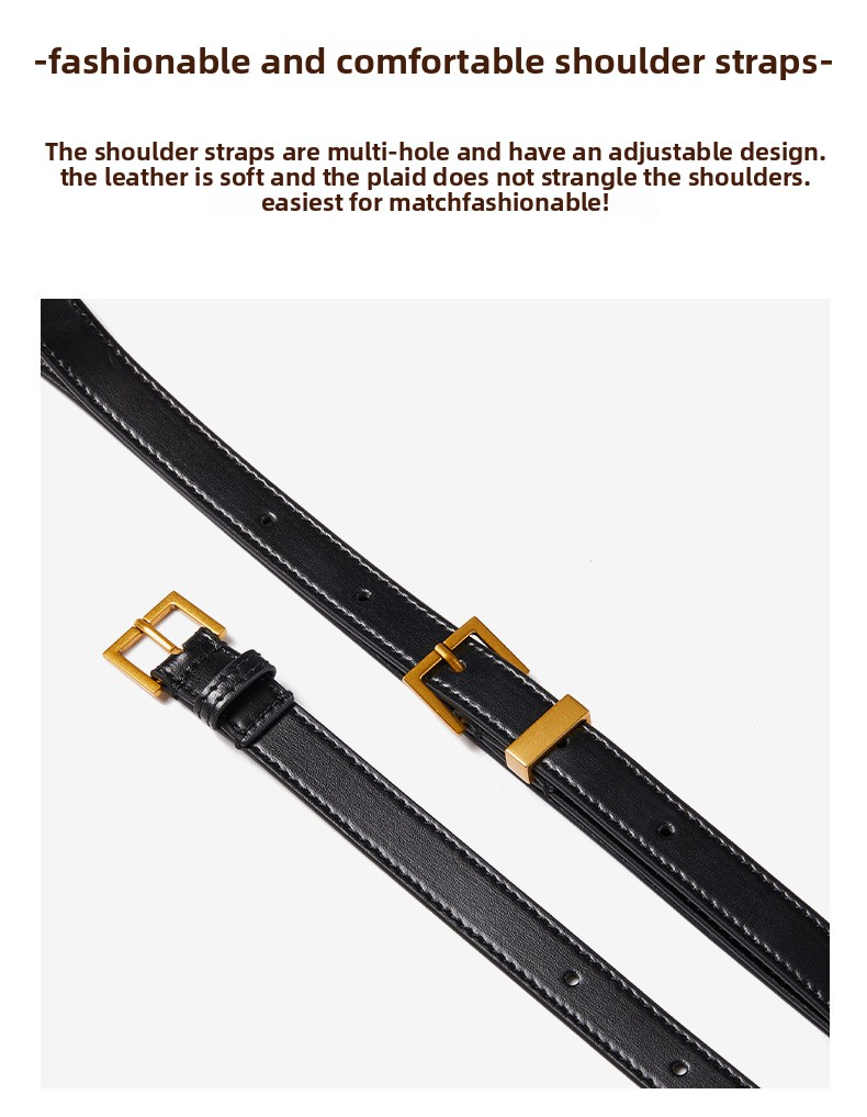 Black leather shoulder strap with gold buckle on a white background