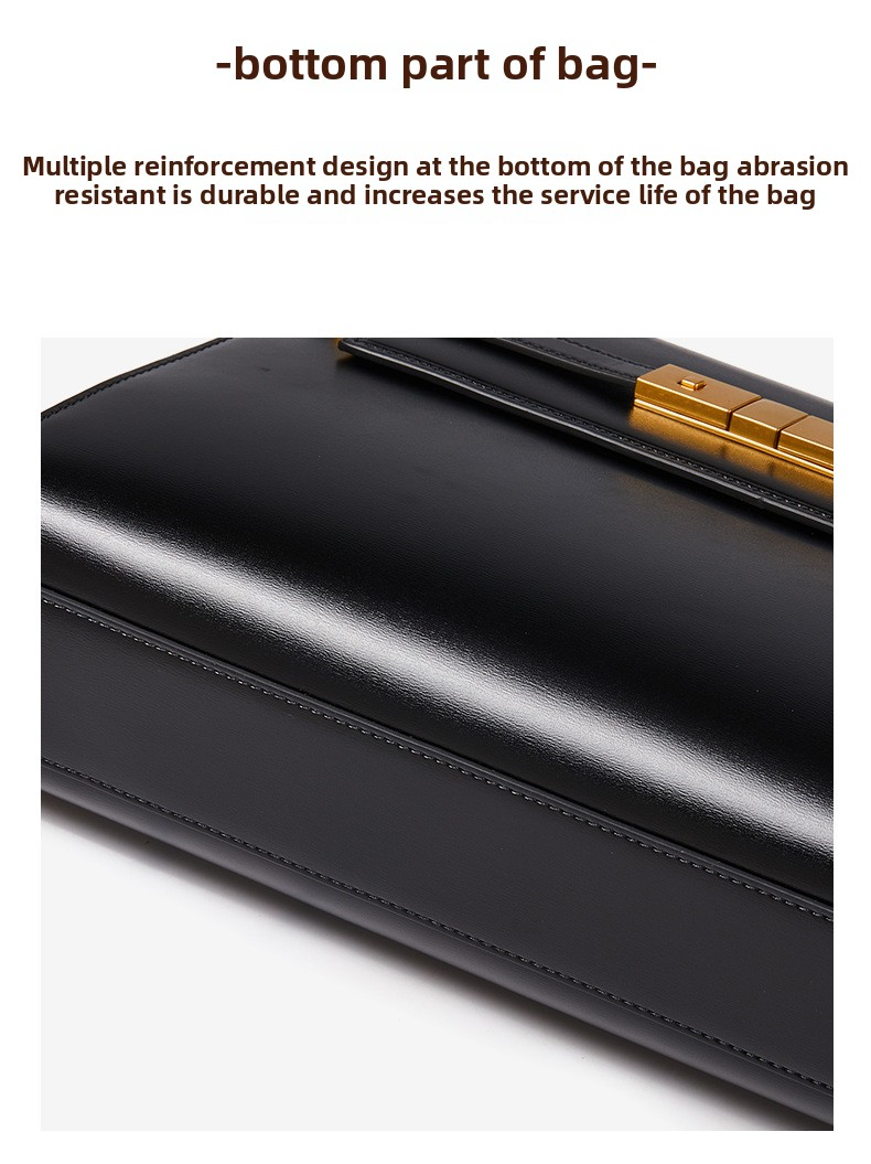 Black bag with gold accent on a white background, highlighting the bottom part of the bag.