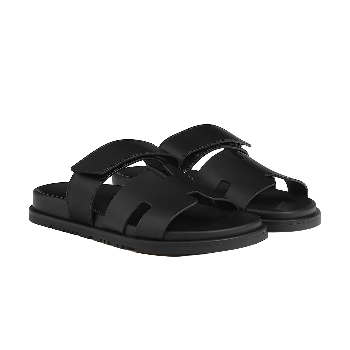 Black sandals on a light gray background